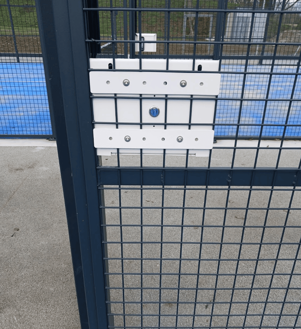 Padel court exit with a dedicated button