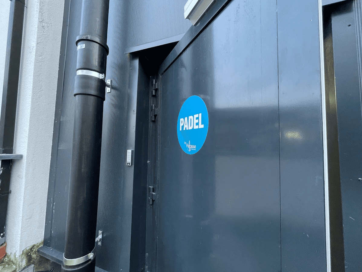 Indoor padel entrance: player keypad access and staff badge reader